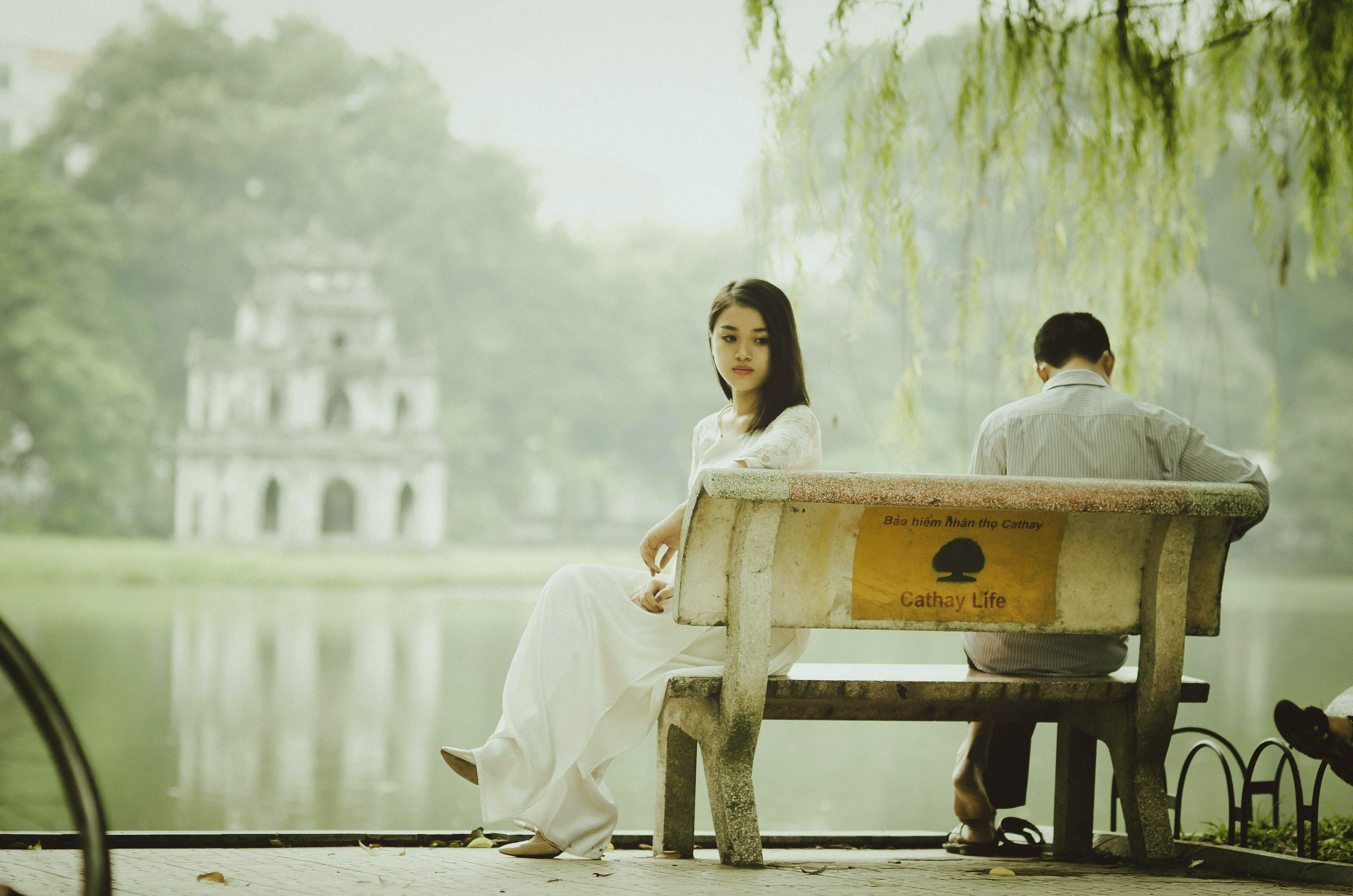 A girl and a boy sitting beside each other but not meeting eye-to-eye resembles a slow burn trope